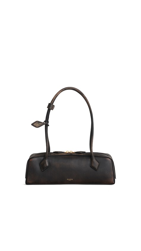 ALA&Iuml;A LE TECKEL MEDIUM BAG IN AGED LEATHER EBENE