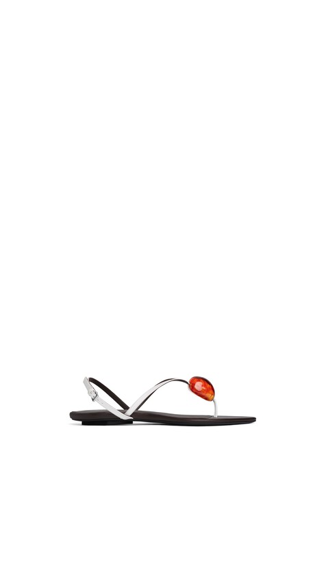 ALA&Iuml;A FLAT JEWEL SANDALS IN PATENT LEATHER OPTICAL WHITE