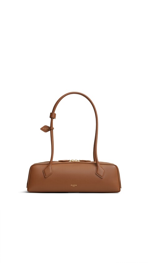 ALA&Iuml;A LE TECKEL MEDIUM BAG IN CALFSKIN AMBER