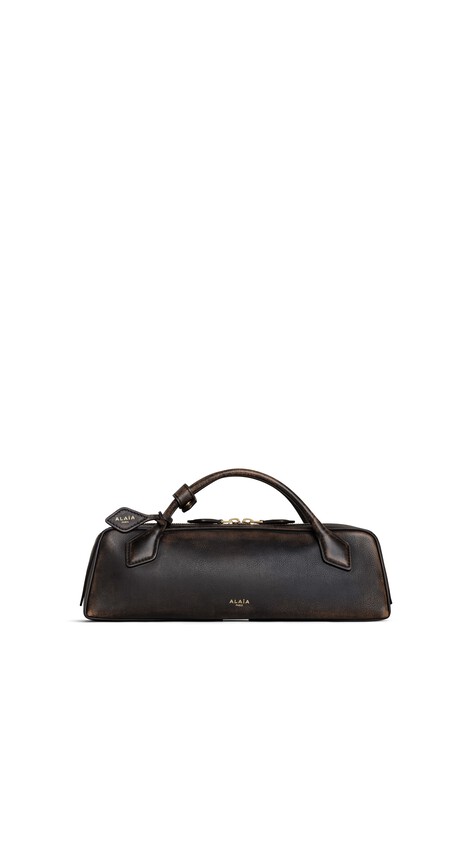 LE TECKEL CLUTCH IN AGED LEATHER