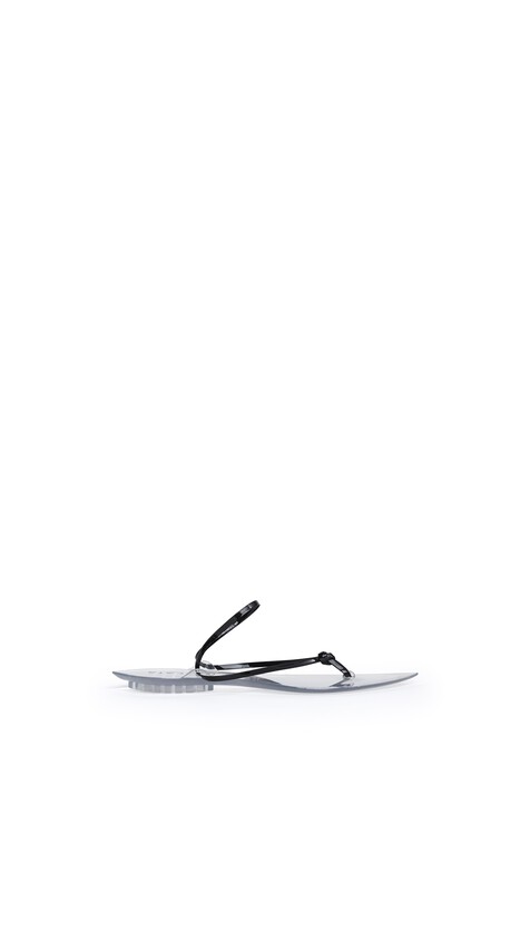 ALA&Iuml;A INVISIBLE THONG IN PATENT LEATHER BLACK