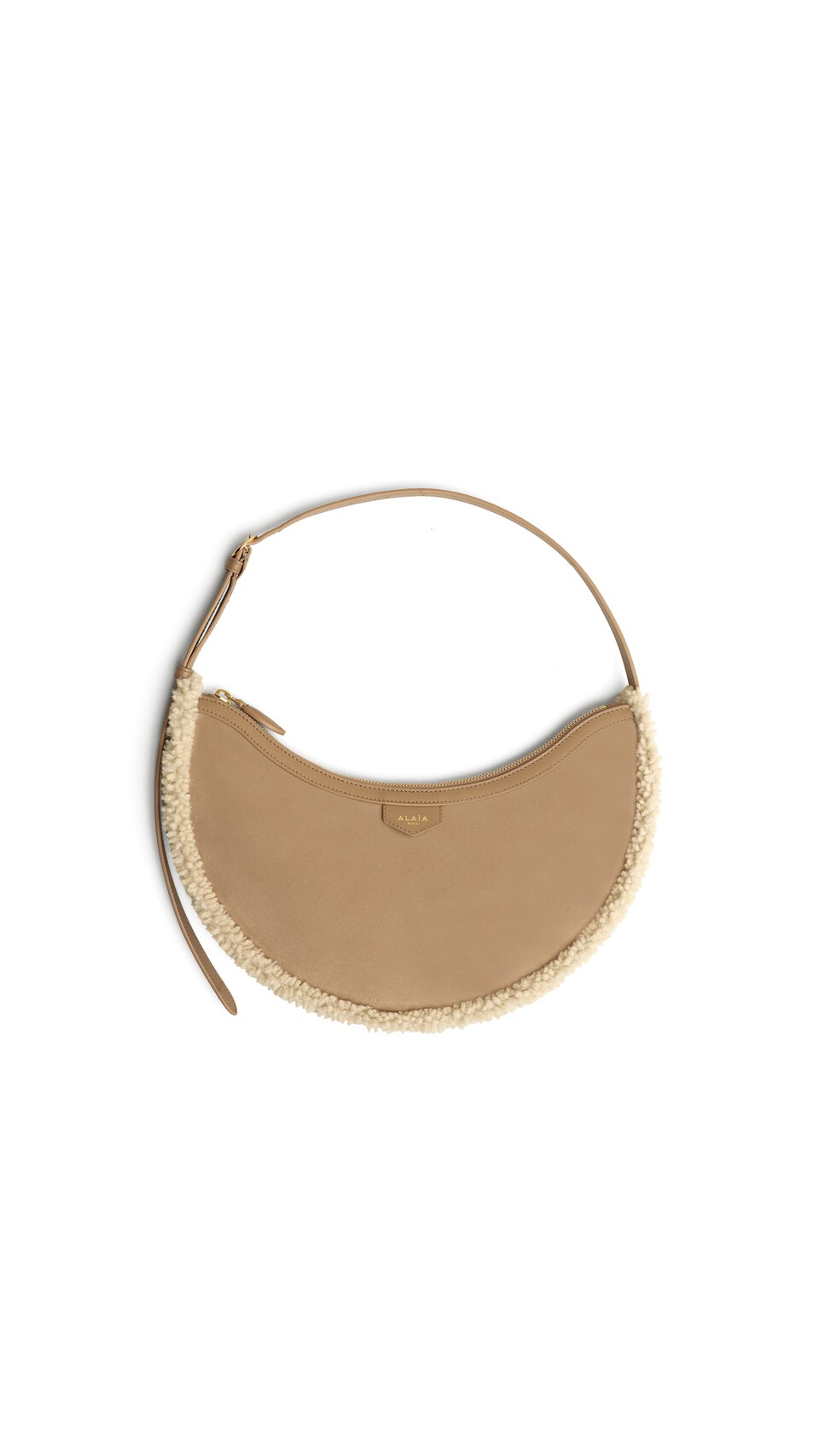 ALA&Iuml;A ONE PIECE DEMI LUNE BAG IN MERINO SHEARLING CAMEL