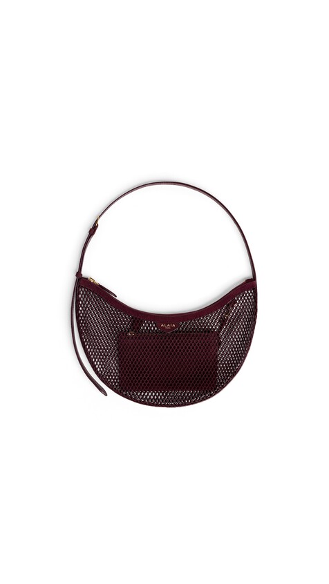 ALA&Iuml;A ONE PIECE DEMI LUNE BAG IN FISHNET AND SUEDE GARNET RED