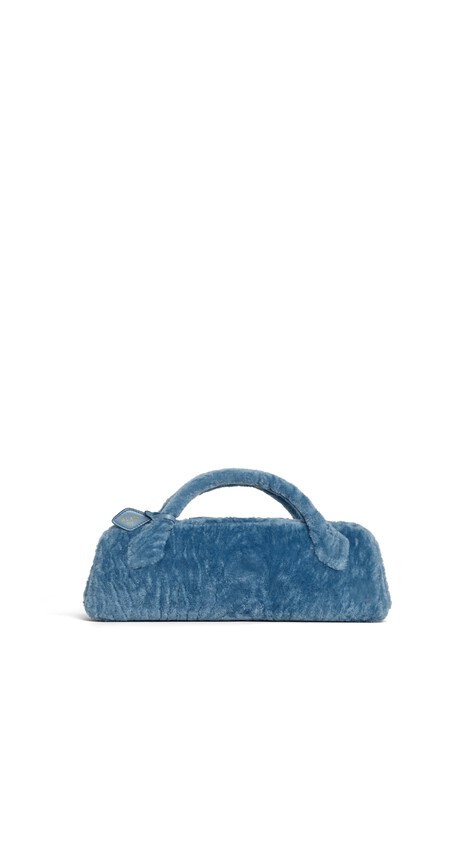 LE TECKEL CLUTCH IN SHAVED SHEARLING