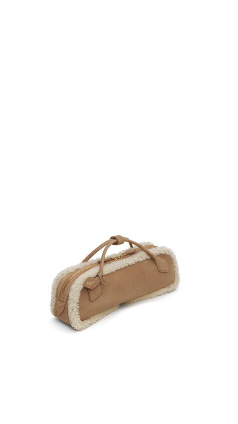 LE TECKEL CLUTCH IN MERINO SHEARLING 